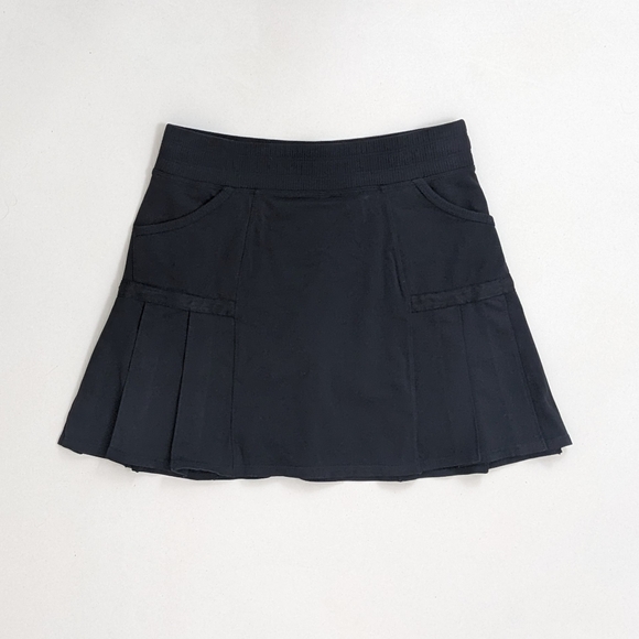 Athleta Dresses & Skirts - Athleta Tennis Skort Black Pleated Size S